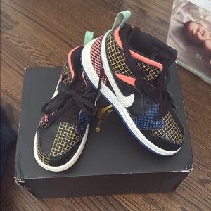 Nike Black and Red Sneakers with Modern Athletic Design